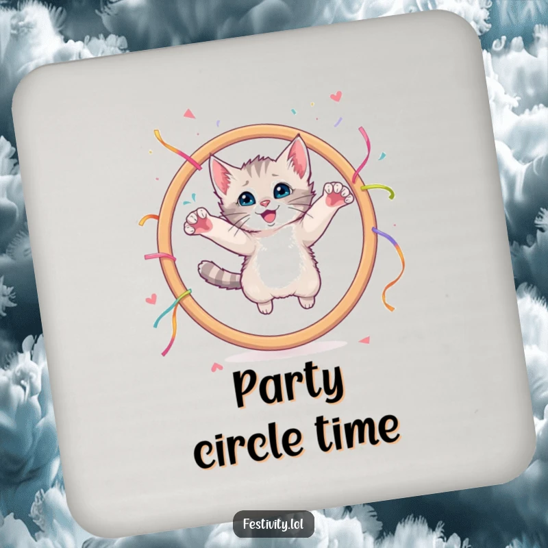 Funny drink coaster showing a curious kitten leaping through a large hoop with streamers.