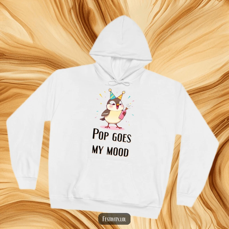 Funny chickadee hoodie showing a happy bird with a party popper exploding in a shower of confetti, perfect for cozy, cheerful days.