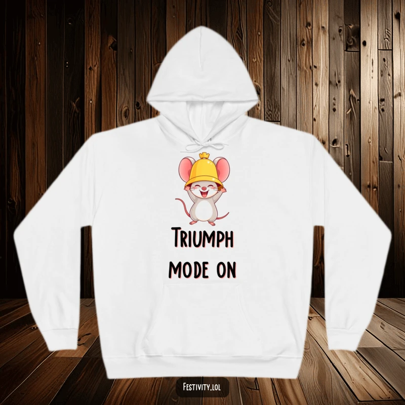 Funny hoodie showing a triumphant mouse ringing a giant golden bell with joy, perfect for cozy celebration.
