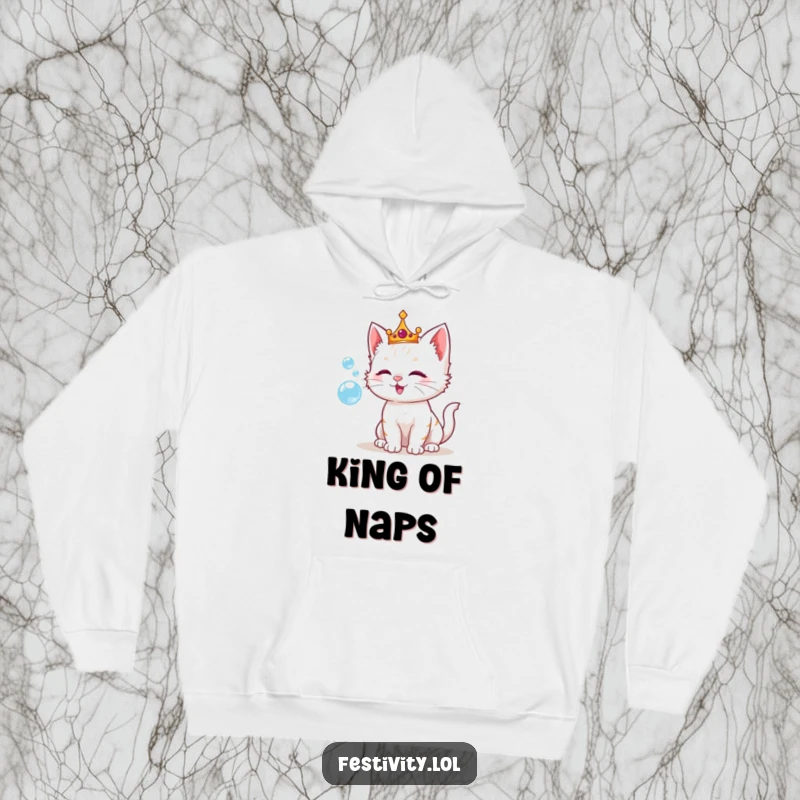 Funny hoodie depicting a playful kitten wearing a crown, blissfully blowing shimmering bubbles, perfect for lounging in regal style.