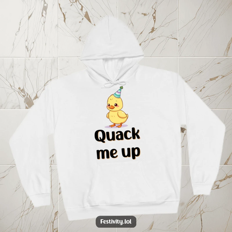 Funny hoodie depicting a wobbly duckling struggling to balance a tiny cake with candles, perfect for festive coziness.