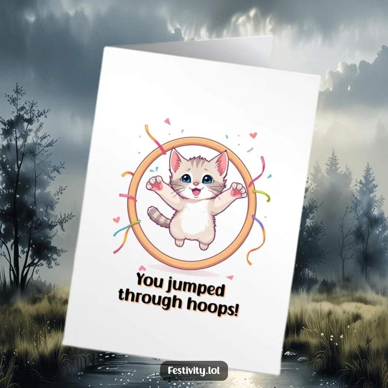 Funny Free Printable Congrats Card: A kitten triumphantly leaps through a giant hoop covered in colorful streamers.