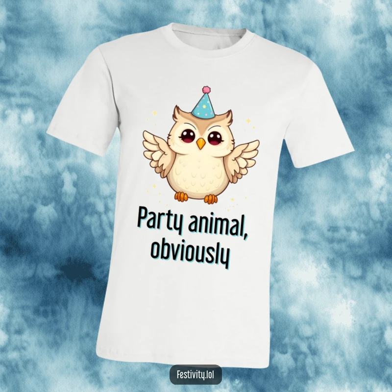 Funny owl t-shirt capturing a joyous owl in a party hat spilling glitter from its wings, perfect for expressing playful celebration.